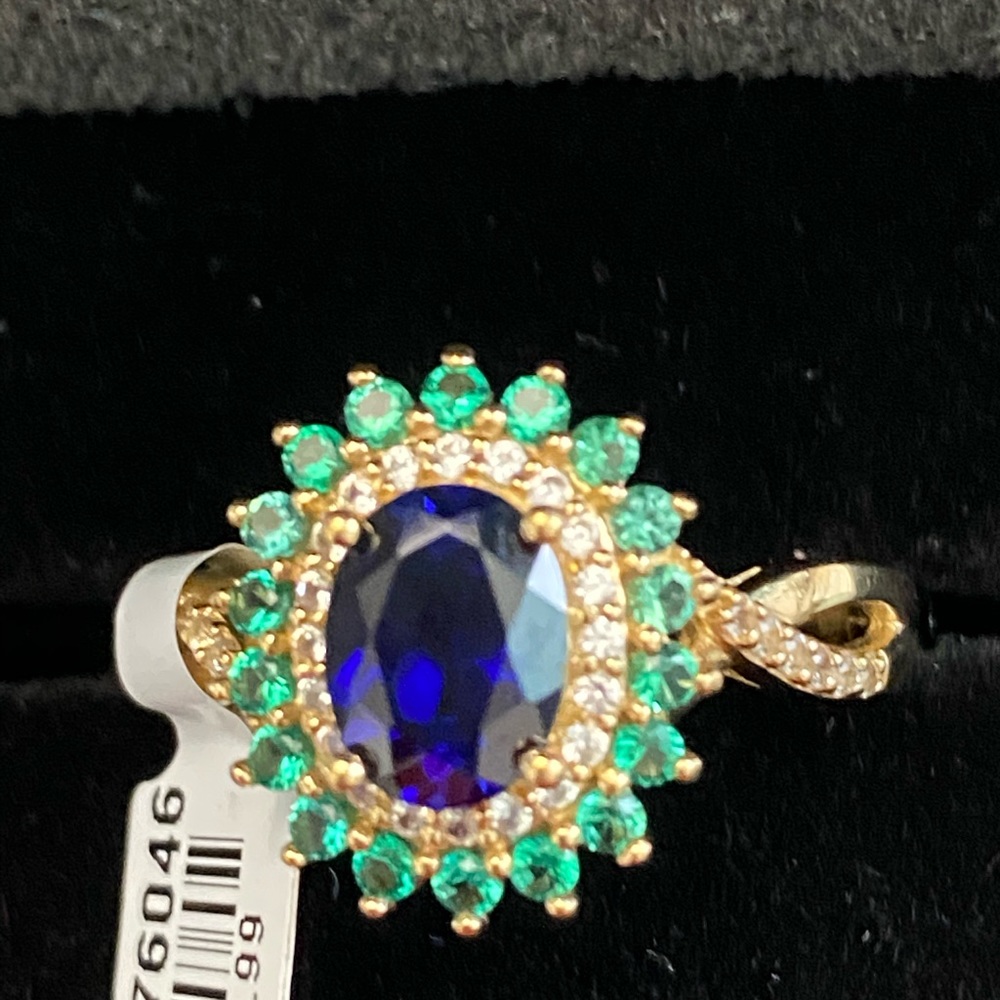 Blue and green with diamond clusters ring
